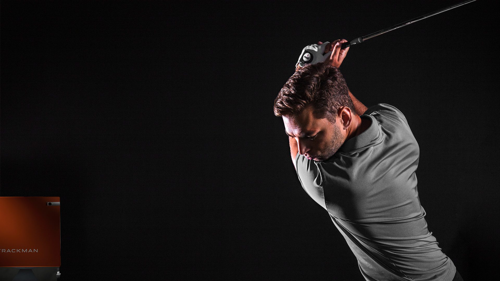 Golfspiller i simulator